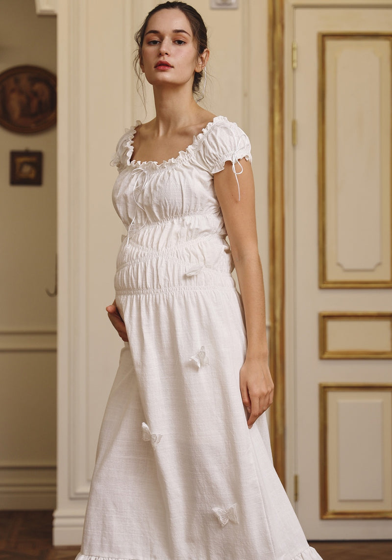 LINEN DRESS WITH BUTTERFLY APPLIQUE